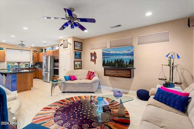 living room featuring ceiling fan