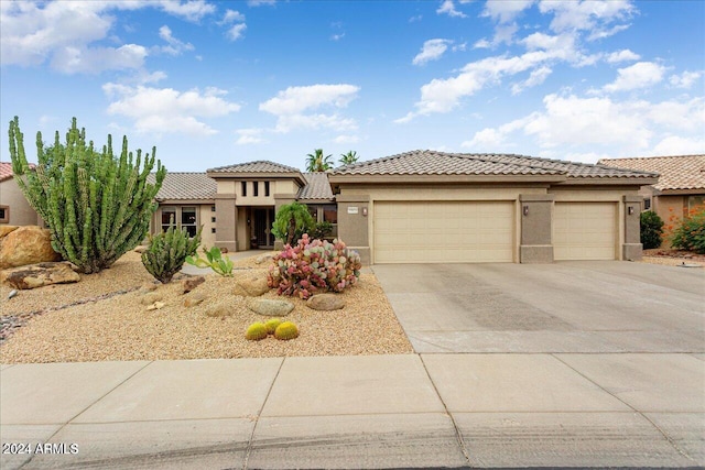 view of front of home with a garage