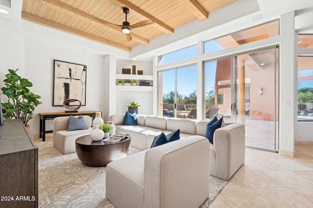 tiled living room with ceiling fan, beam ceiling, and wood ceiling