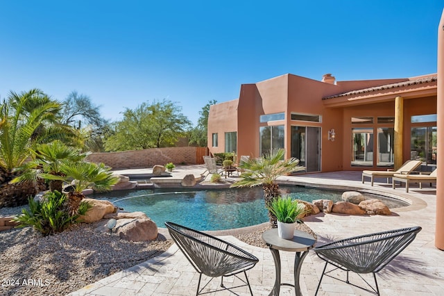 view of pool with a patio