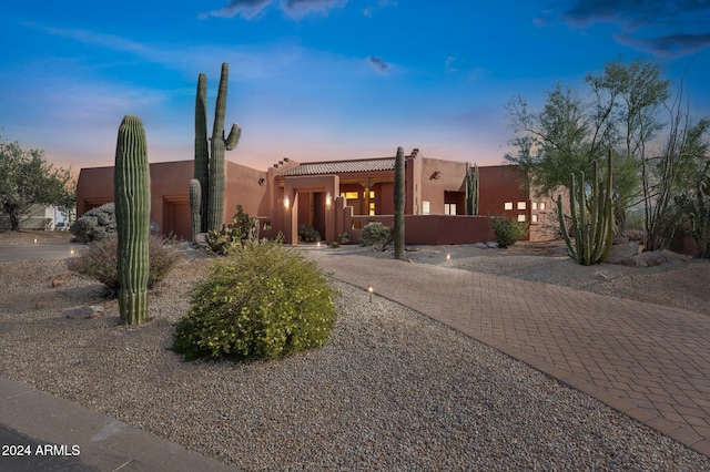 view of pueblo revival-style home