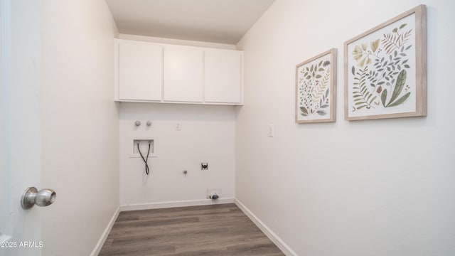 clothes washing area with cabinet space, electric dryer hookup, baseboards, and hookup for a gas dryer