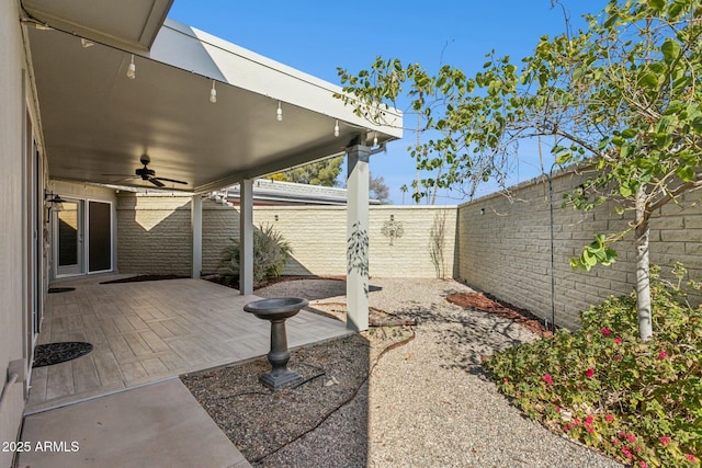 view of patio with ceiling fan