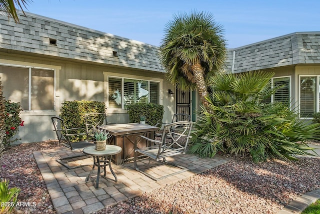 view of patio / terrace featuring a hot tub