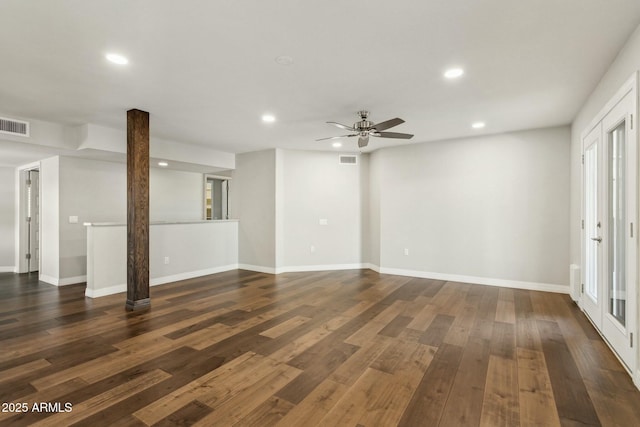 unfurnished living room featuring dark hardwood / wood-style floors and ceiling fan