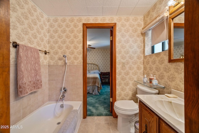 11 N County Road N1030 St, Greer, AZ 85927 - ensuite bathroom with a tub, vanity, tile patterned floors, wallpapered walls, and toilet