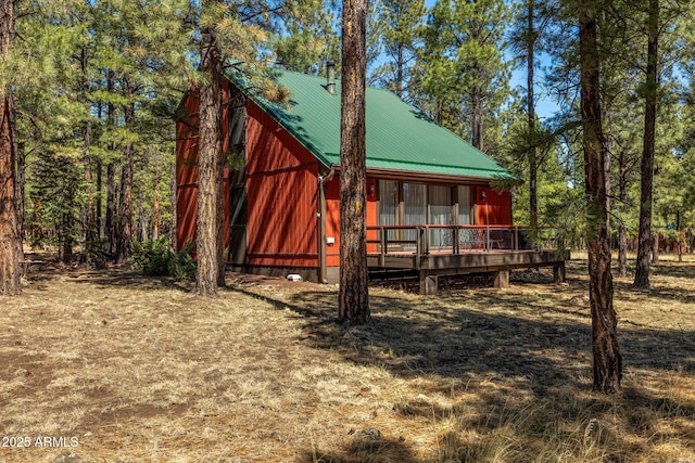 11 N County Road N1030 St, Greer, AZ 85927 - back of house featuring metal roof and a deck