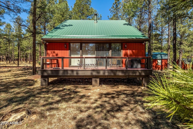 11 N County Road N1030 St, Greer, AZ 85927 - rear view of property with metal roof