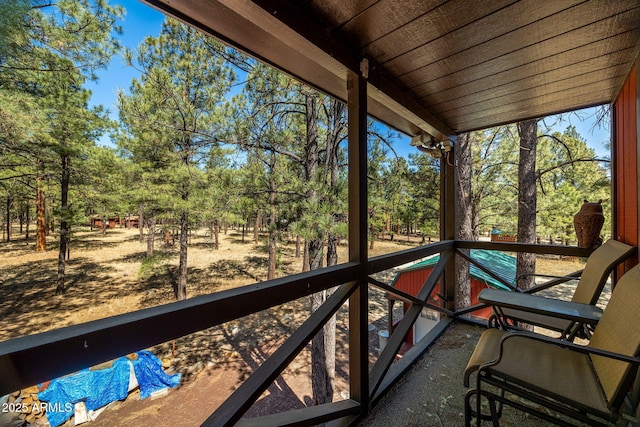 11 N County Road N1030 St, Greer, AZ 85927 - sunroom / solarium with view of scattered trees