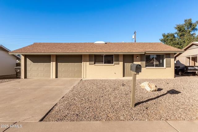 single story home with a garage