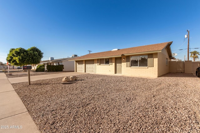 ranch-style home with a garage