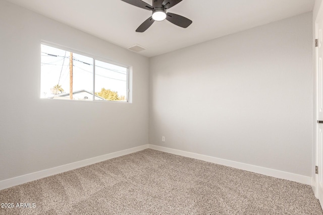 carpeted empty room with ceiling fan