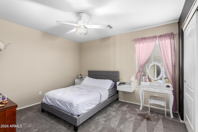 bedroom with carpet floors, a closet, and ceiling fan