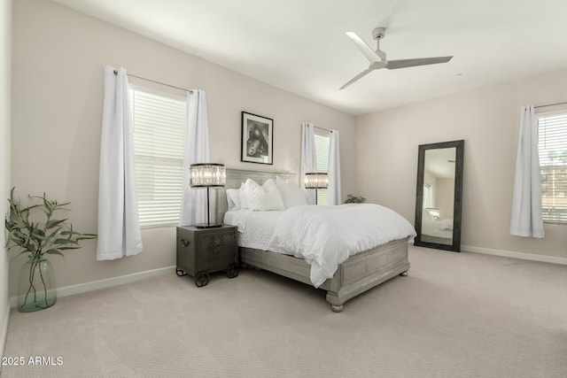 1829 N 43rd Ter, Phoenix, AZ 85008 - bedroom featuring baseboards, light carpet, and multiple windows