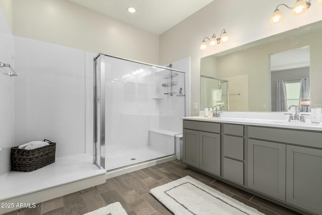 1829 N 43rd Ter, Phoenix, AZ 85008 - full bathroom featuring a sink, double vanity, a stall shower, and wood finished floors