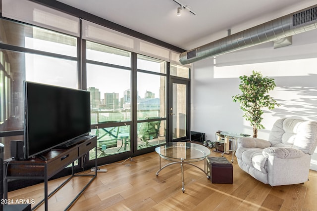 interior space featuring a wealth of natural light and track lighting