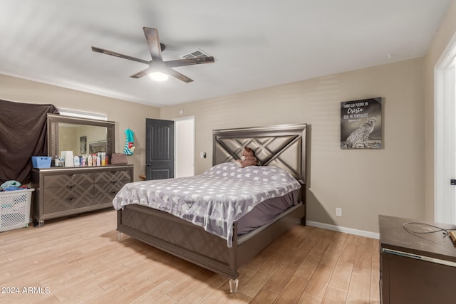 bedroom featuring ceiling fan and light hardwood / wood-style flooring