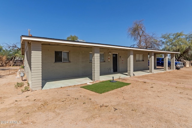 view of front of home with a patio