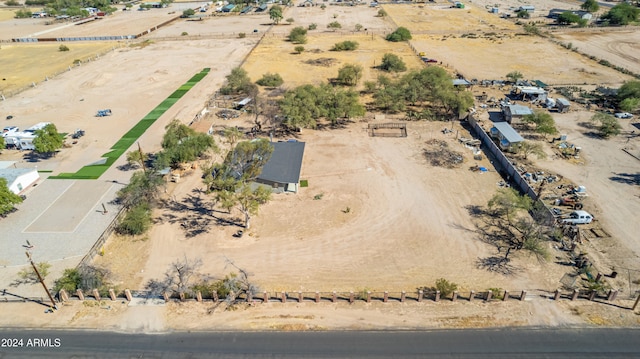 birds eye view of property featuring a rural view