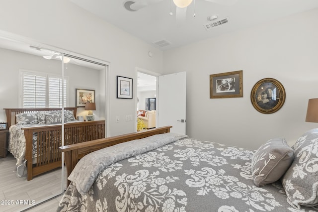 bedroom featuring a closet and ceiling fan