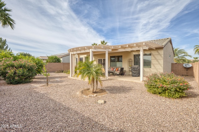 back of house featuring a patio area