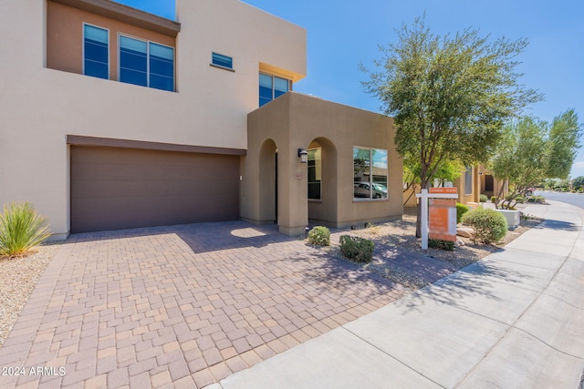 view of front of home featuring a garage