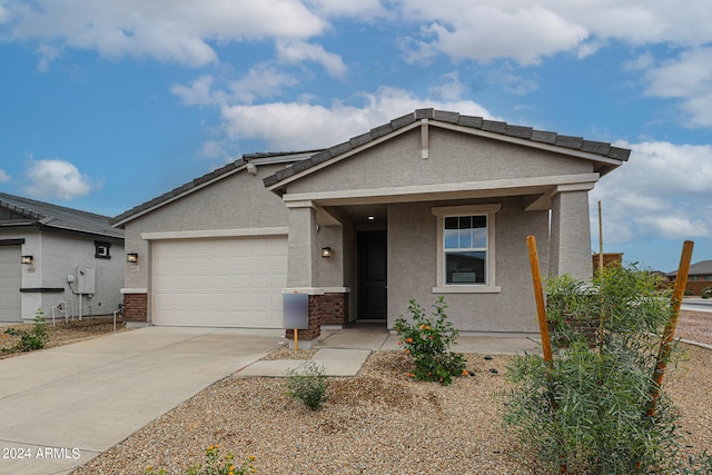 view of front of property featuring a garage