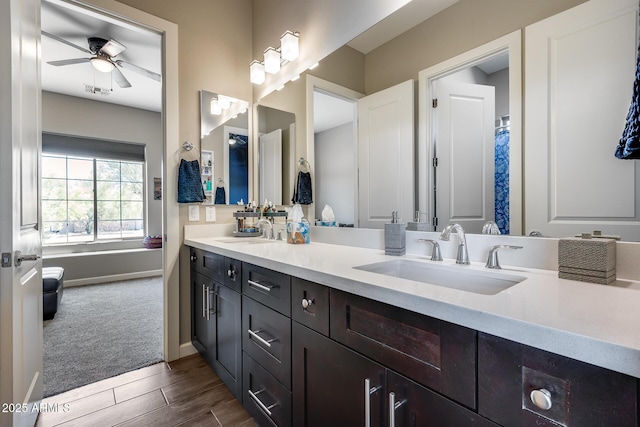 30511 N 162nd Way, Scottsdale, AZ 85262 - full bathroom with double vanity, ceiling fan, baseboards, and wood finished floors