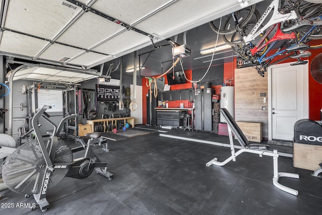 30511 N 162nd Way, Scottsdale, AZ 85262 - workout area with a garage, a workshop area, and electric water heater
