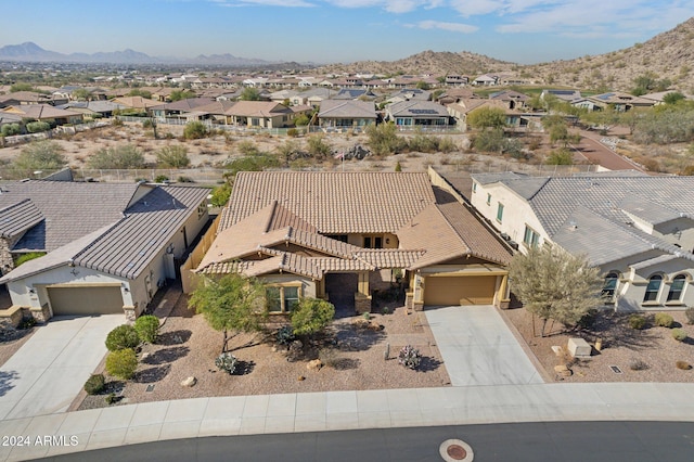 drone / aerial view featuring a mountain view