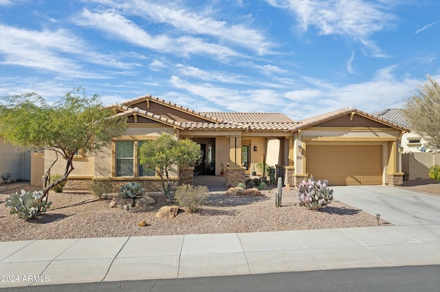 view of front of property featuring a garage