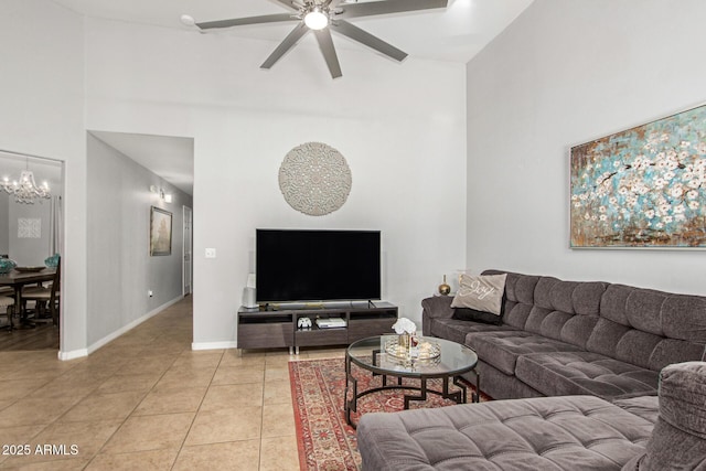 1201 E Campbell Ave, Gilbert, AZ 85234 - living room with a high ceiling, a chandelier, a ceiling fan, and light tile patterned floors