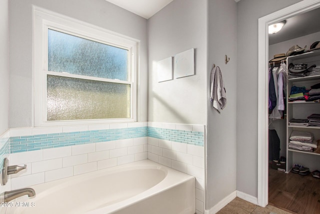 1201 E Campbell Ave, Gilbert, AZ 85234 - full bath with a bath, a walk in closet, and tile patterned flooring