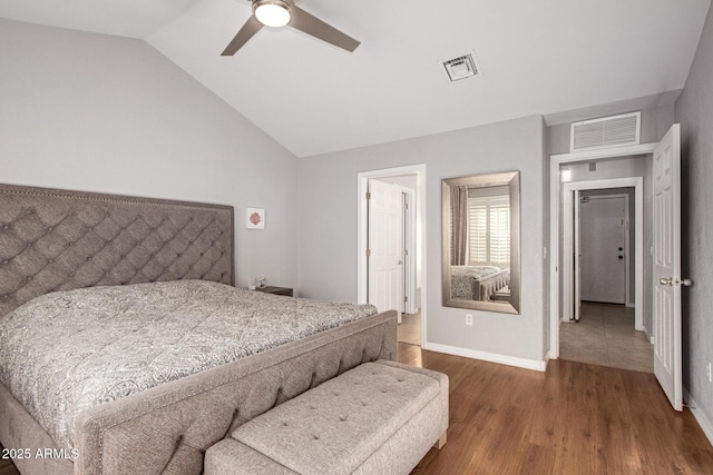 1201 E Campbell Ave, Gilbert, AZ 85234 - bedroom featuring vaulted ceiling, wood finished floors, and a ceiling fan