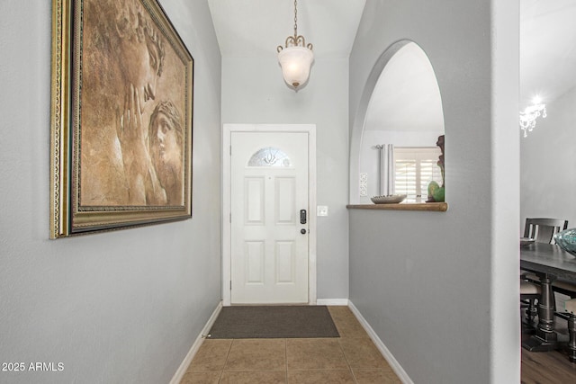 1201 E Campbell Ave, Gilbert, AZ 85234 - doorway to outside featuring arched walkways and tile patterned floors
