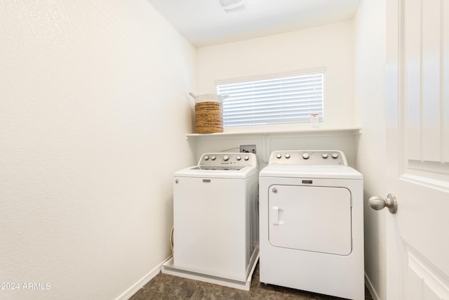 clothes washing area featuring independent washer and dryer