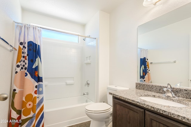 full bathroom featuring shower / tub combo, vanity, and toilet