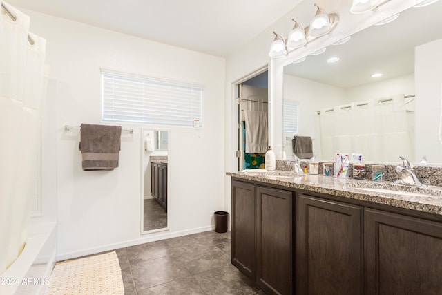 bathroom featuring vanity and tile patterned floors