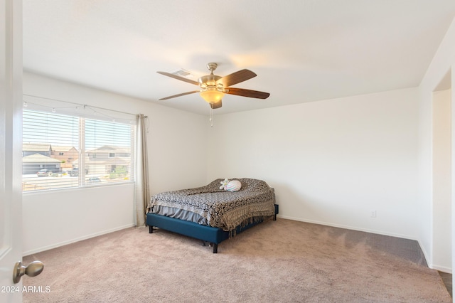 bedroom with carpet flooring and ceiling fan