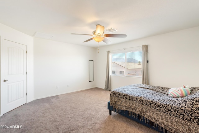 carpeted bedroom with ceiling fan