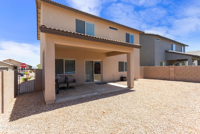 rear view of house with a patio area