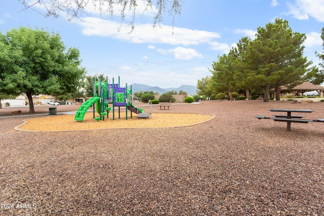 view of play area featuring a mountain view