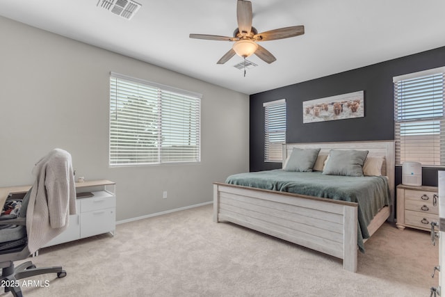 724 S 11th St, Coolidge, AZ 85128 - bedroom featuring multiple windows, a desk, light carpet, and a ceiling fan