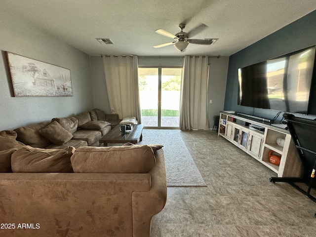 724 S 11th St, Coolidge, AZ 85128 - living room with ceiling fan and a textured ceiling