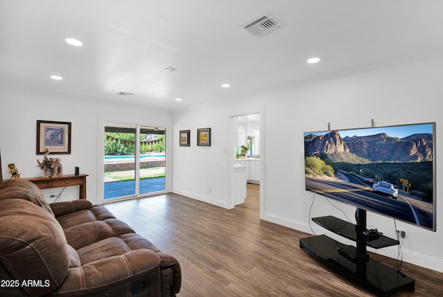 2607 E Mercer Ln, Phoenix, AZ 85028 - living area with recessed lighting, wood finished floors, and ornamental molding