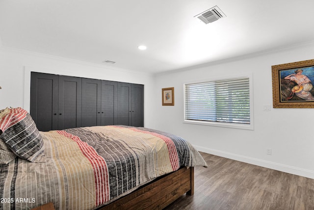 2607 E Mercer Ln, Phoenix, AZ 85028 - bedroom with crown molding, wood finished floors, and recessed lighting