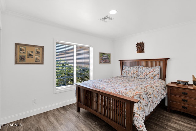 2607 E Mercer Ln, Phoenix, AZ 85028 - bedroom with crown molding, wood finished floors, and recessed lighting