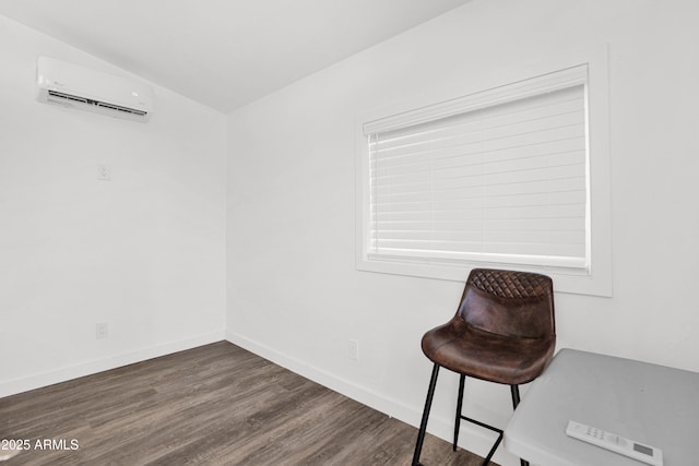 2607 E Mercer Ln, Phoenix, AZ 85028 - unfurnished room featuring a wall mounted AC, wood finished floors, and lofted ceiling