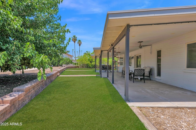 2607 E Mercer Ln, Phoenix, AZ 85028 - view of green lawn with a patio and ceiling fan