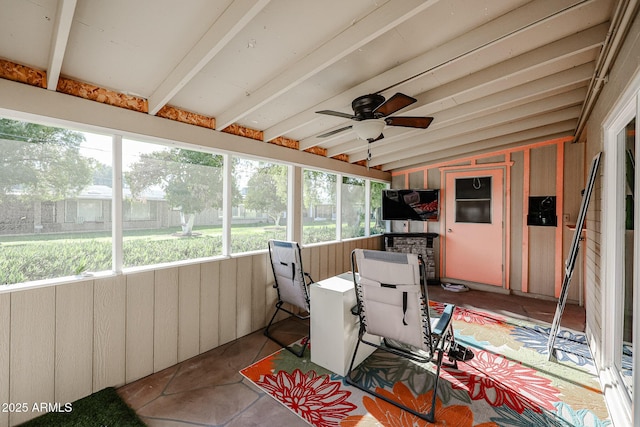 sunroom / solarium with vaulted ceiling and ceiling fan